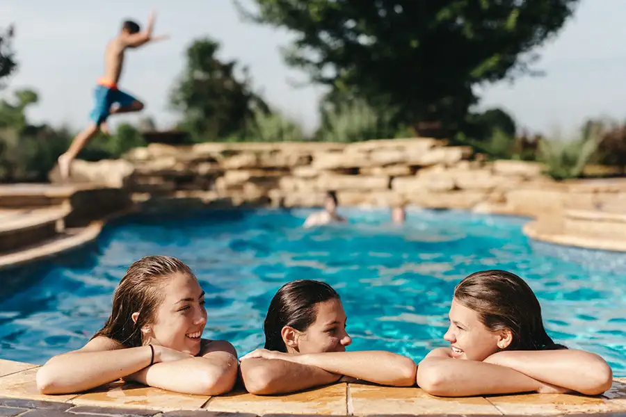 young people enjoying custom designed in-ground swimming pool - Decatur, IL