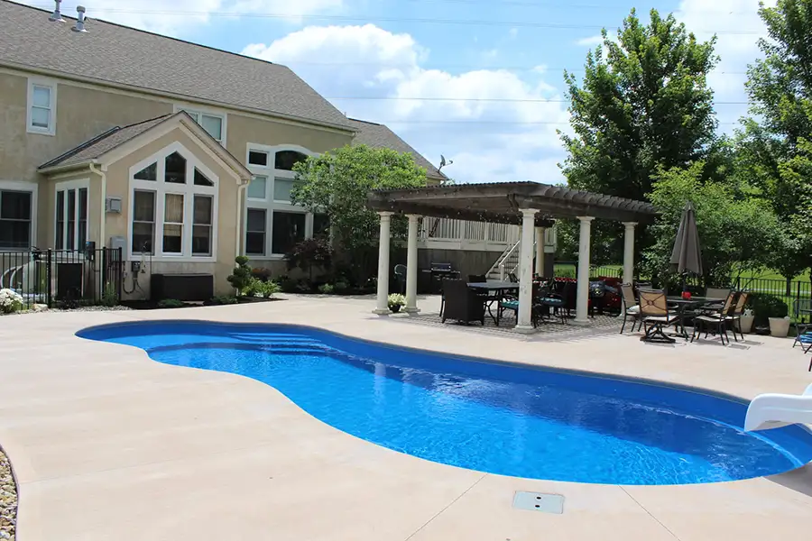 luxury home with freestyle shaped in-ground swimming pool - Decatur, IL